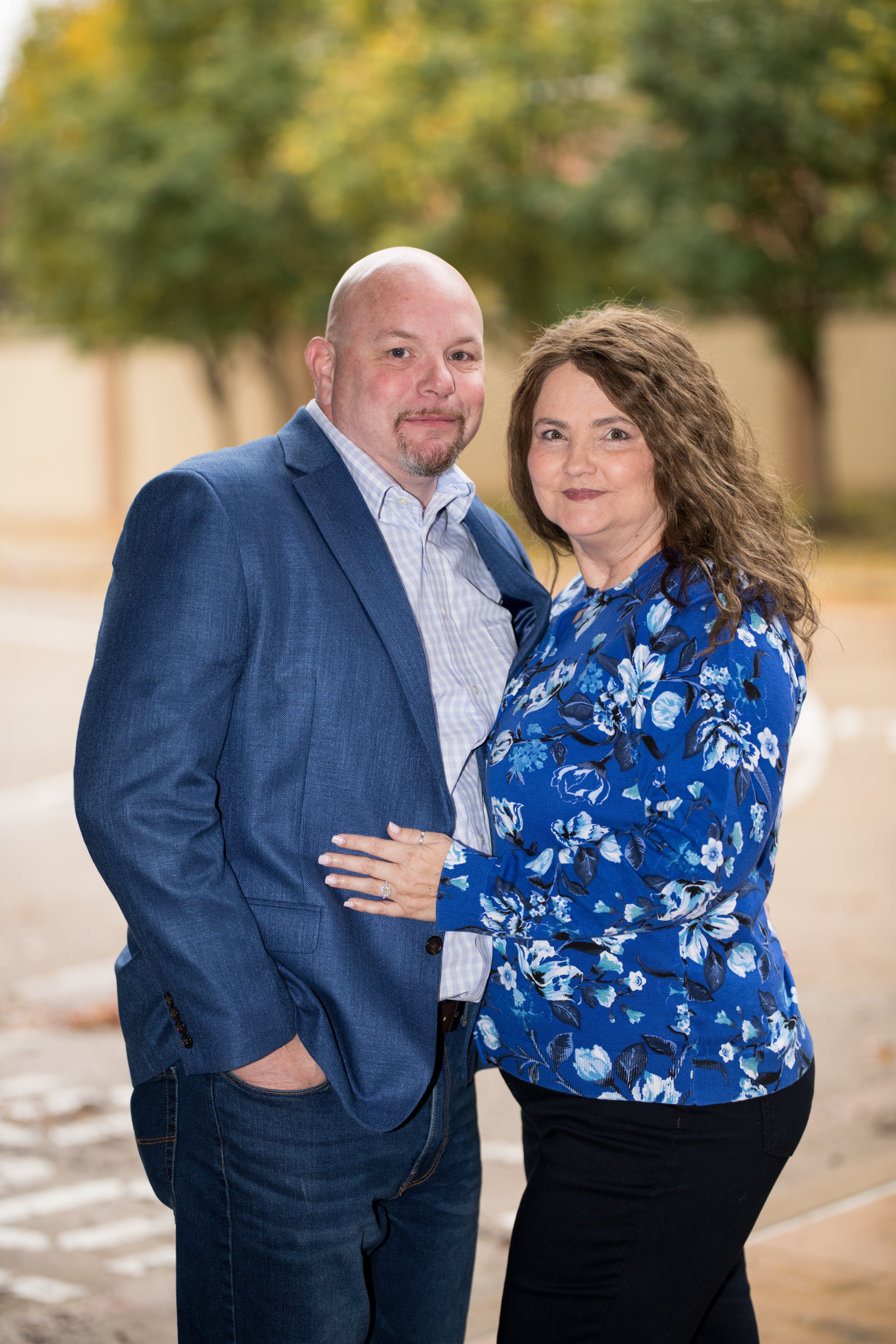 couple smiling during engagement photo