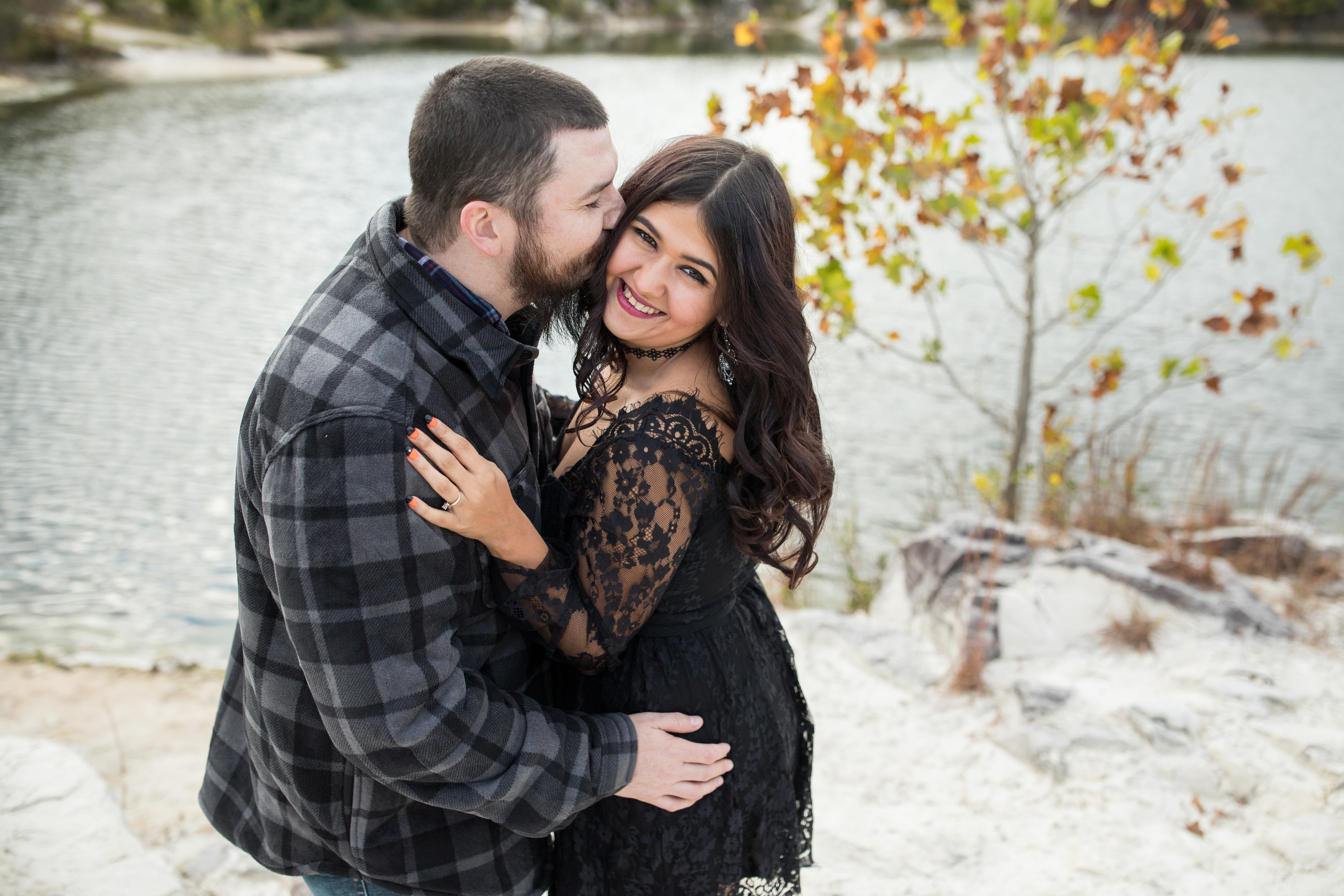 fall engagement photo next to lake