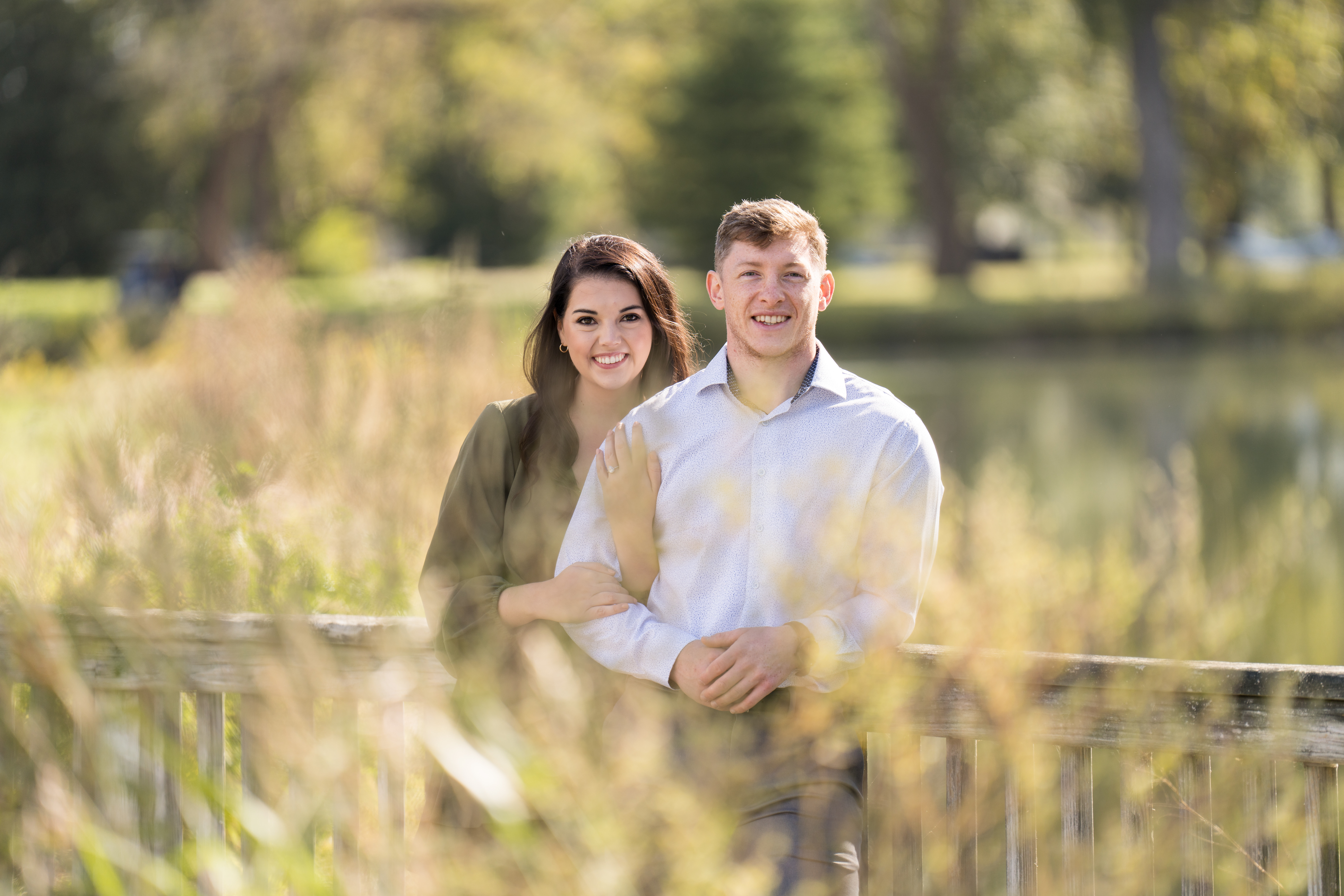 couple smiling during engagement photo