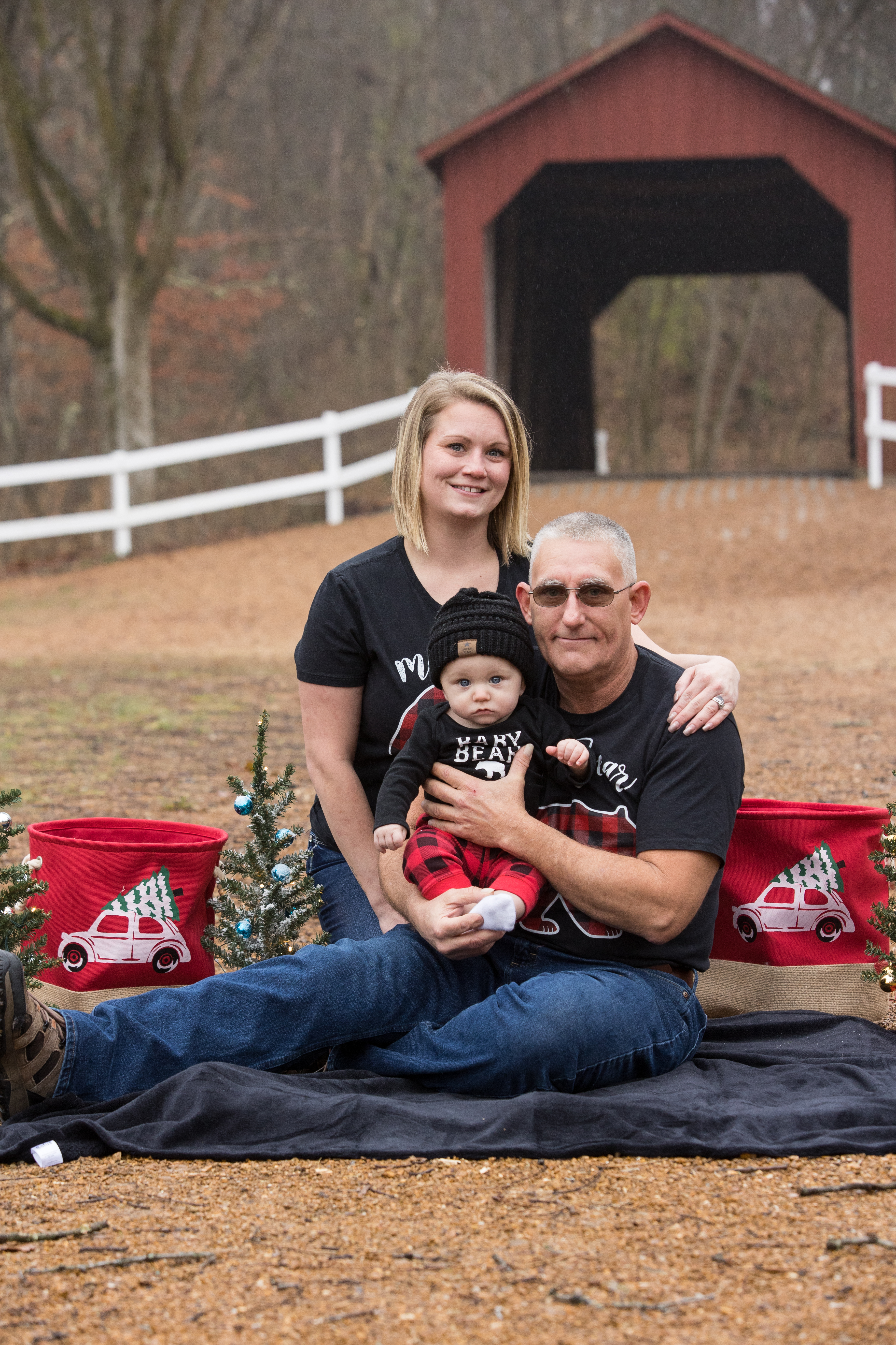 Christmas family photo with couple and baby