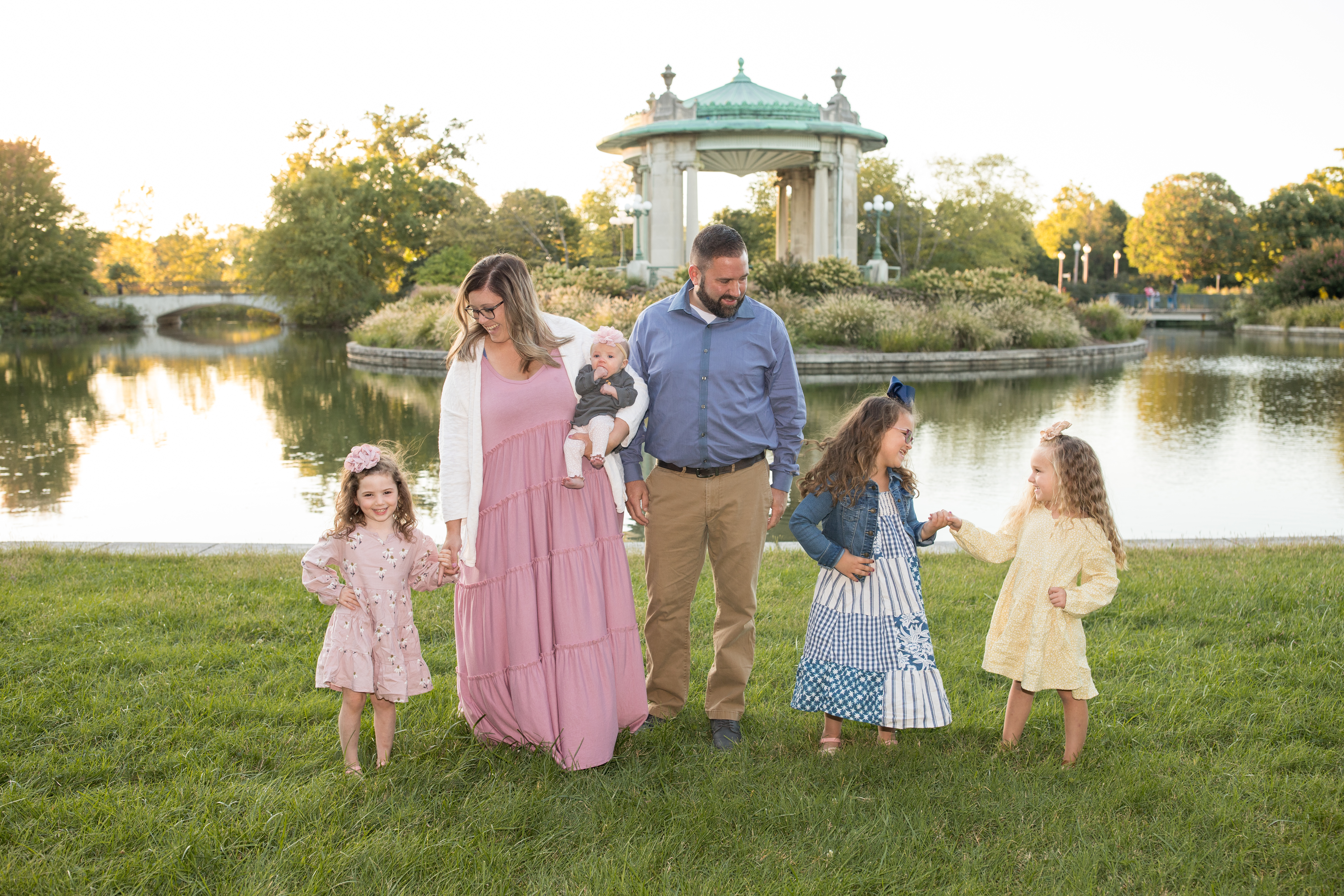 couple with their four daughters family photo